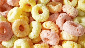 A macro video of breakfast cereal shot with a probe lens, showcasing its mesmerizing texture, colors, and crunch. Each delicate piece comes to life, Savor the delightful morning indulgence.
