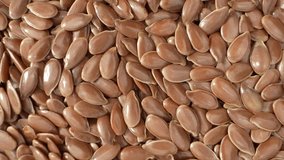 Flax seeds contain lignans, a type of phytoestrogen and antioxidant. Lignans have been associated with potential anti-cancer properties and may help balance hormone levels in the body. Macro video
