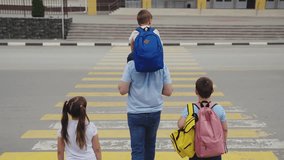asphalt zebra crossing, school road, student happy family road, green light, father hand girl boy, feet shoes people walking busy city street, people crowd feet road, children feet rush hour road, son - Powered by Shutterstock - Get 15% off with code: PIKWIZARD15