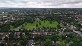 Aerial View Shot of London Suburbs UK, United Kingdom, overcast with sunny patches, English houses and homes, typical neighbourhood, residential property, local community, Carshalton