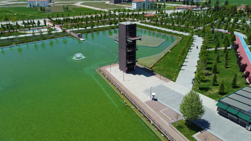 Artificial Tower near a Pond and Trees