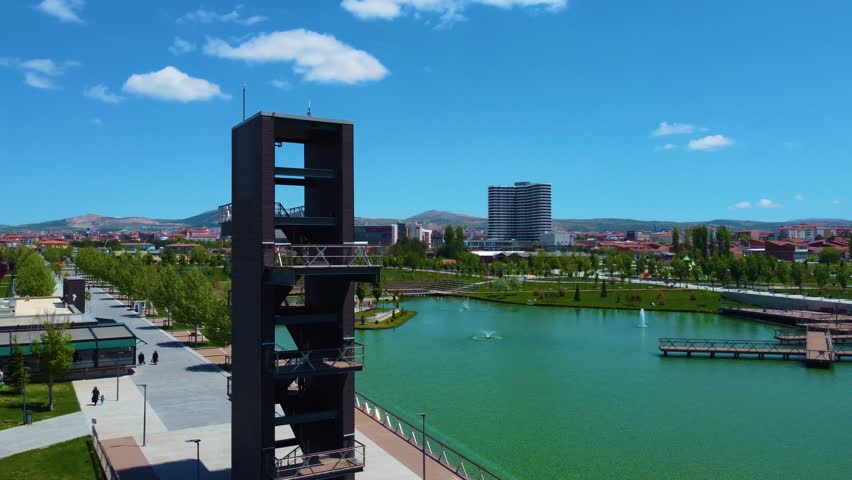Artificial Tower in a Park and City
