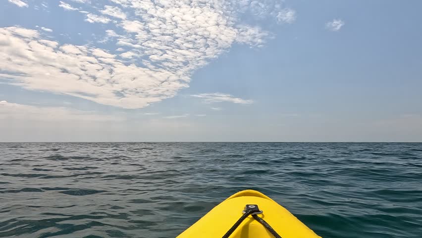 Sea kayak yellow horizon. Kayaking in the sea on a sunny day. Royalty-Free Stock Footage #1107399167