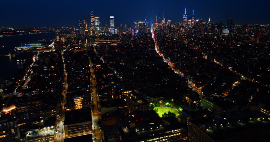 Night New York city aerial view. Perspective of New yorl scyscrapers street. Royalty-Free Stock Footage #1107411243