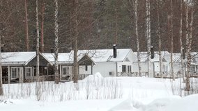 Winter landscape, snowing over the houses. Sweden, Lulea. Idyllic Winter Landscape - Powered by Shutterstock - Get 15% off with code: PIKWIZARD15