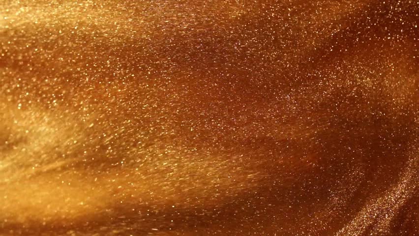 Gold liquid with tints of golden glitters. Yellow background with a scattering of gold sparkles. Magic Galaxy of golden dust particles in fluid.  Royalty-Free Stock Footage #1107414163