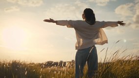 Happy smiling young woman enjoying nature. Young asian woman having fun in the meadow. freedom concept. Sunset - Powered by Shutterstock - Get 15% off with code: PIKWIZARD15