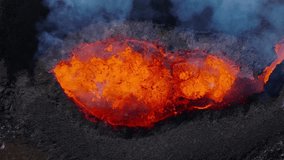 Above volcano eruption with hot molten magma in crater, Litli Hrutur - Powered by Shutterstock - Get 15% off with code: PIKWIZARD15