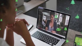 Animation of connected icons, diverse female coworkers discussing reports on video call. Digital composite, multiple exposure, business, communication, teamwork, notification, technology concept. - Powered by Shutterstock - Get 15% off with code: PIKWIZARD15