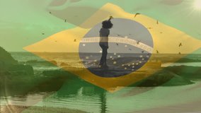 Animation of waving brazil flag against biracial couple walking together at the beach. Patriotism and love relationship concept - Powered by Shutterstock - Get 15% off with code: PIKWIZARD15