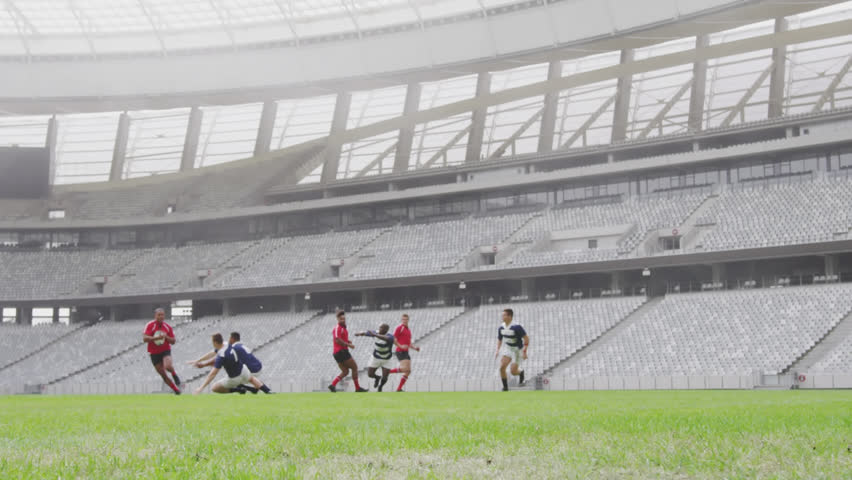Animation of multiple icons over diverse rugby player playing friendly match in stadium. Digital composite, multiple exposure, teamwork, sports, protection, shopping and competition concept.