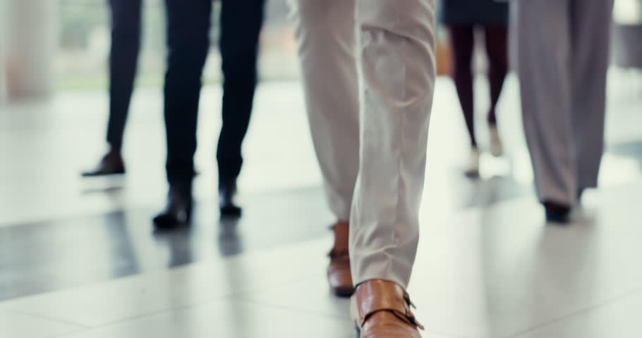 Walking, legs and floor of company with business people for work in the morning as a group. Team, office and shoes and feet of employees in the workplace together for a corporate career on the ground