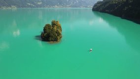 Aerial photographs of the tiny island of Schengen in Lake Brienz near the village of Iseltwald in the Bernese Oberland in the Swiss Alps