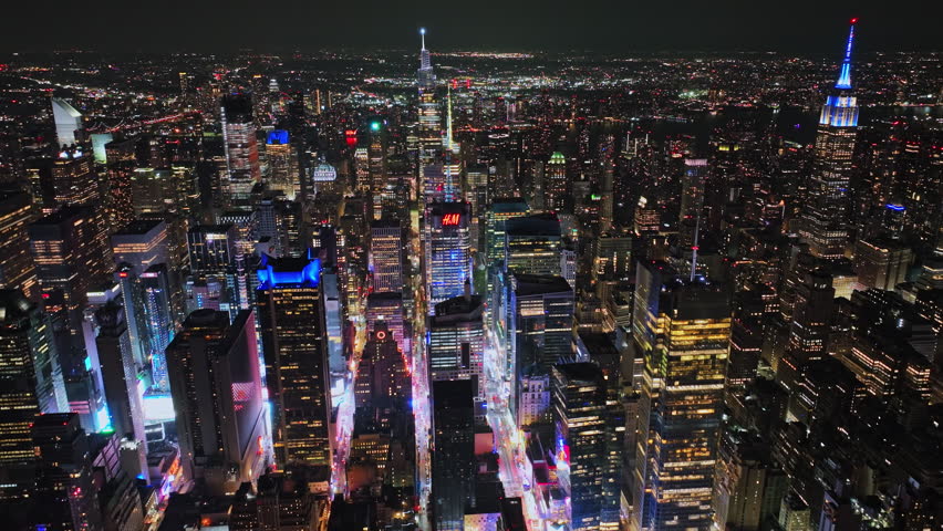 A stunning aerial view of the vibrant city of New York at night