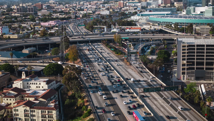 Establishing Aerial View Shot of Los Angeles LA CA, L.A. California US, traffic, busy freeway, Harbour Freeway 110, Santa Monica Freeway 10 