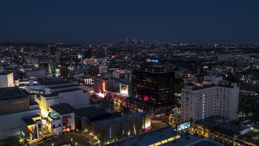 Establishing Aerial View Shot of Los Angeles at night evening, LA CA, L.A. California US, TCL Chinese Theatre, West Hollywood, Walk of Fame, Hollywood Sign, Hollywood Heights, Hollywood BLVD, downtown