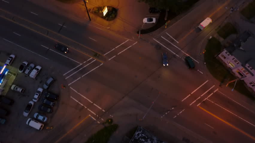 Aerial Tilt Up Shot Of Vehicles On Streets In City At Night - Boston, Massachusetts