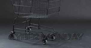 Animation of cyber monday text over shopping trolley. Sales, retail, cyber shopping, digital interface, communication, computing and data processing concept digitally generated video.
