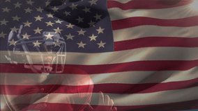 Animation of flag of usa over caucasian male american football player. Patriotism, sports and competition concept digitally generated video.