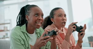 Friends, video game and women on sofa playing online, virtual and digital games in living room. Competition, gaming and excited people with controller for bonding, relax or fun together at home
