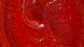 Vertical video, Red tomato ketchup texture circle rotation close up