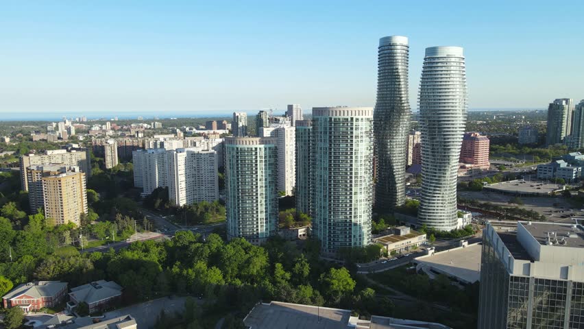 Arial view of Mississauga city center. Drone footage of downtown with skyscrapers. View from above on Toronto GTA in summer sunset Royalty-Free Stock Footage #1107509901
