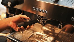 Professional barista making beautiful latte art on coffee using plant based alternative milk, high quality 4K slowmotion modern coffee shop concept footage.
