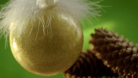 New Year's ball move on a beautiful background with shining lights, christmas abstract design for video montage. Filmed on cinema camera, slow motion, 8K downscale, 4K.