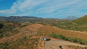 man pilot driving drone. Aerial view of energy producing wind turbines. Shot from drone. wind farm or wind park, Energy producing wind turbines in Turkey, Datca region. - Powered by Shutterstock - Get 15% off with code: PIKWIZARD15
