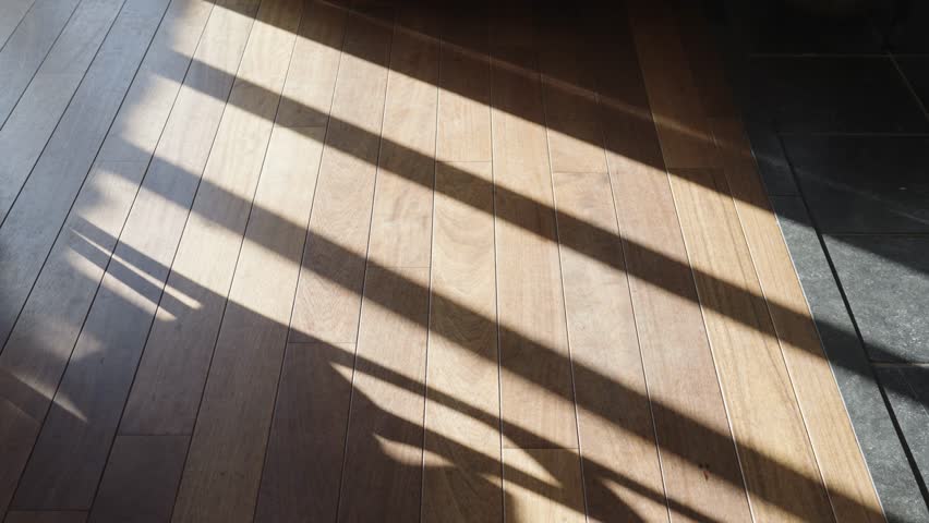 Morning or Afternoon Warm Light and Shadow on Wood Floor Inside The House - Powered by Shutterstock - Get 15% off with code: PIKWIZARD15