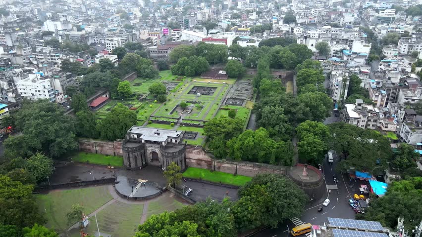 Drone footage of Shaniwar wada fort in Pune, India. Indian historical fortification in the city of Pune. Fort situated in centre of Pune city. Indian architecture. Smart city India Royalty-Free Stock Footage #1107540277