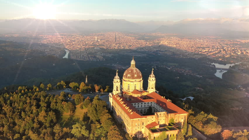Turin skyline aerial view from above, turin italy city drone birds view at sunset. Torino italy.