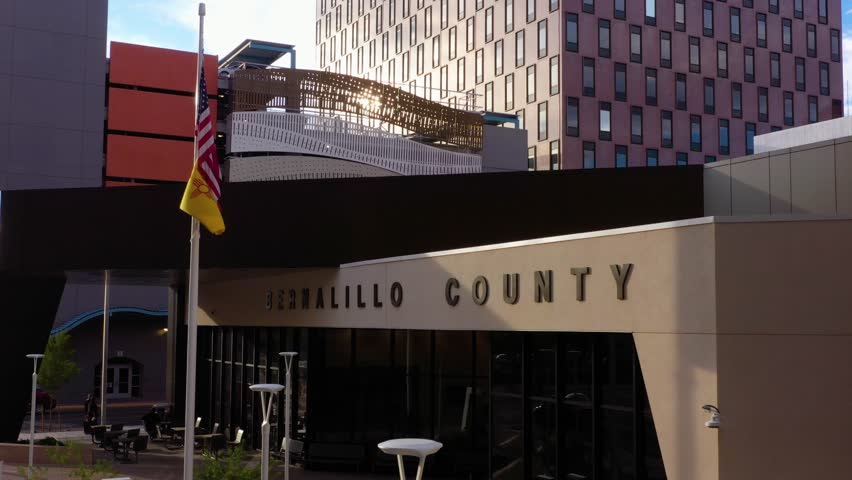 
Push in on downtown Albuquerque building featuring Bernalillo County sign