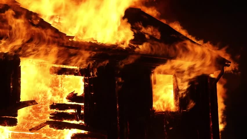 Burning old house, a dark winter morning in Småland, Sweden. Royalty-Free Stock Footage #1107564913