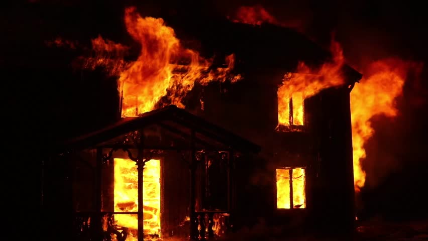 Burning old house, a dark winter morning in Småland, Sweden.