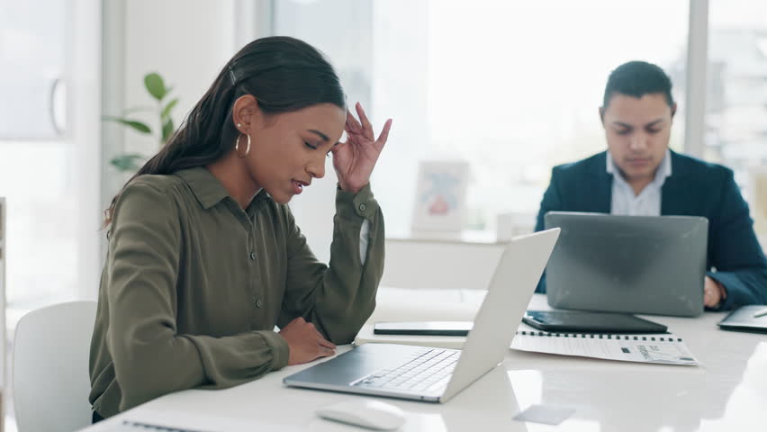 Working, headache and business woman with pain in office, workspace or Indian accounting employee with migraine. Tired, stress or accountant with burnout on audit or frustrated in corporate company | Shutterstock HD Video #1107584371