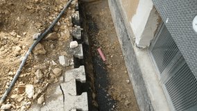 Construction site - insulation of a buildings foundation