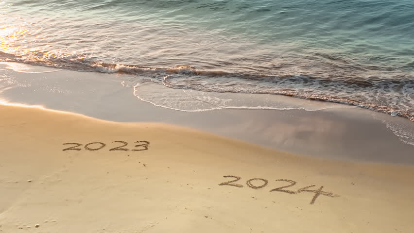 Symbol for the new year 2024. Wave is washing away the inscription 2023. Royalty-Free Stock Footage #1107595393