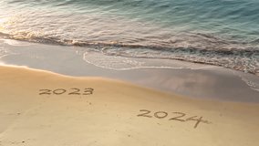 Symbol for the new year 2024. Wave is washing away the inscription 2023. - Powered by Shutterstock - Get 15% off with code: PIKWIZARD15