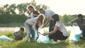 Teamwork of people volunteers cleaning plastic garbage in bags to collect garbage.Group of people volunteers are cleaning plastic garbage together.Ecology environmental pollution with plastic garbage - Powered by Shutterstock - Get 15% off with code: PIKWIZARD15