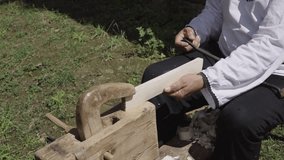 Romanian carpenter wood work on carpenter bench. - Powered by Shutterstock - Get 15% off with code: PIKWIZARD15