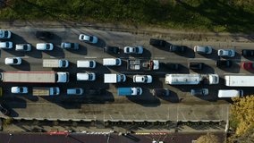Aerial view of busy cars with traffic jam in the rush hour on highway road. Aerial vertical, vertical video background. 