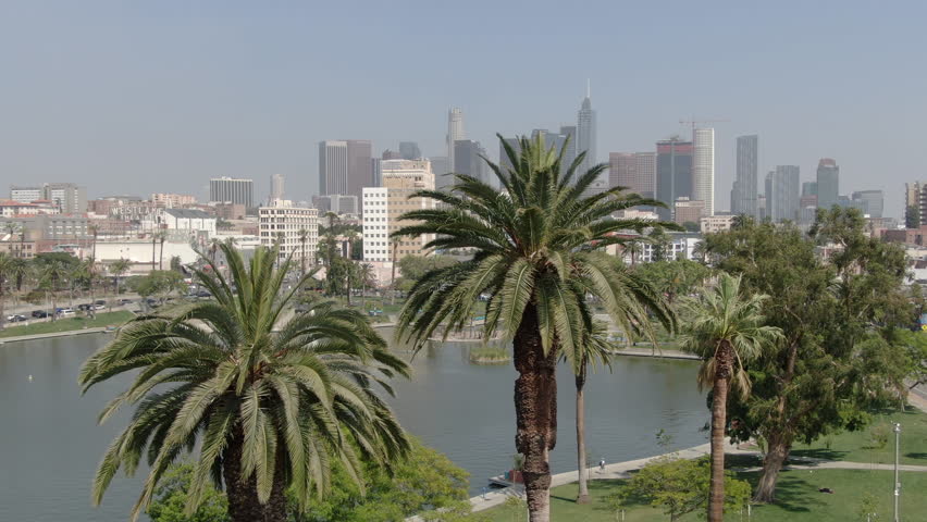 Los Angeles MacArthur Park Aerial Shot Palm Trees Forward