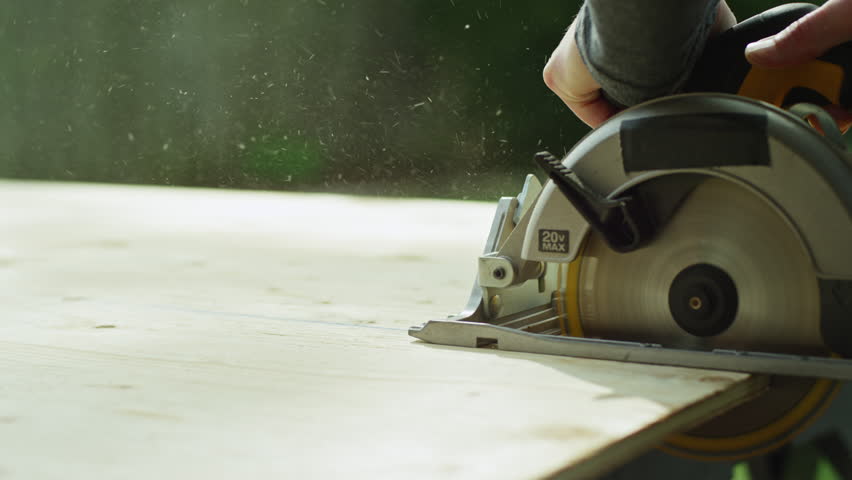 Sawing Plywood Dust Flying Slow Motion Royalty-Free Stock Footage #1107623131