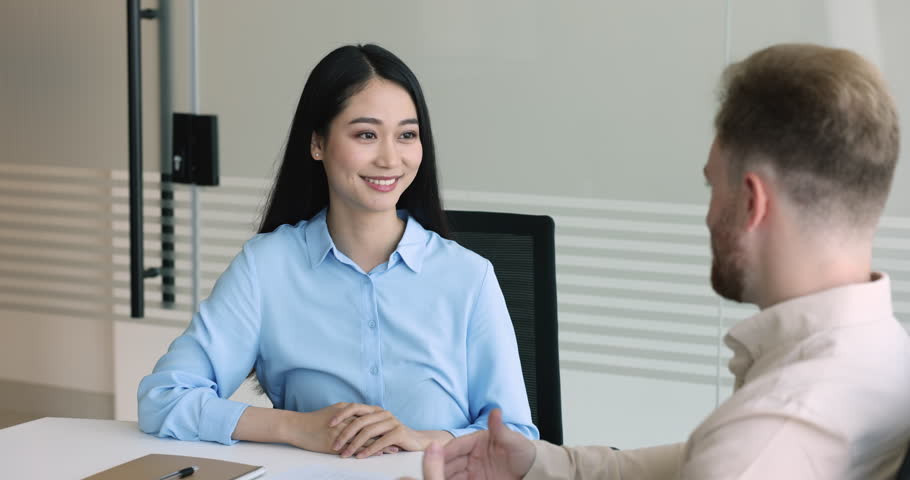 Two business partners make deal, finish formal meeting with shake hands, express respect for cooperation, client feels grateful for good quality services getting, handshake to sales manager in office Royalty-Free Stock Footage #1107623855