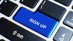 Laptop Keyboard Close Up and Finger Press Sign Up Word or Text Button Key - Powered by Shutterstock - Get 15% off with code: PIKWIZARD15