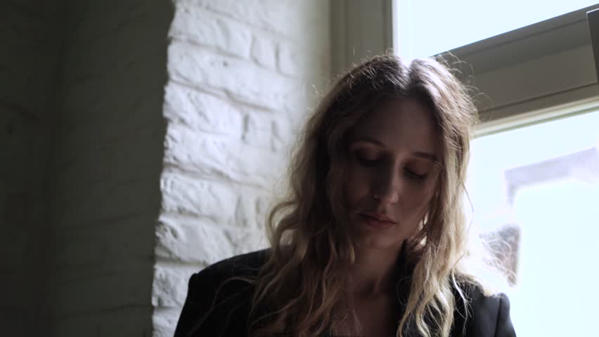 Beautiful girl with smartphone calling and smiling. girl holding cell phone using smartphone device