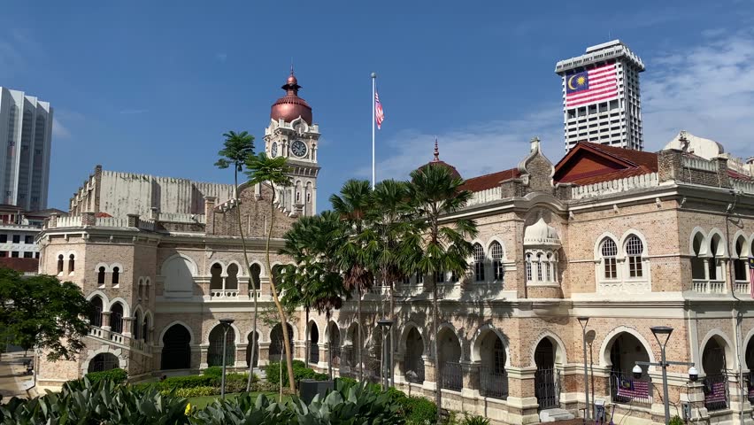 Sultan Abdul Samad building during a blue sky sunny day at Merdeka Independence square in Kuala Lumpur, Malaysia.