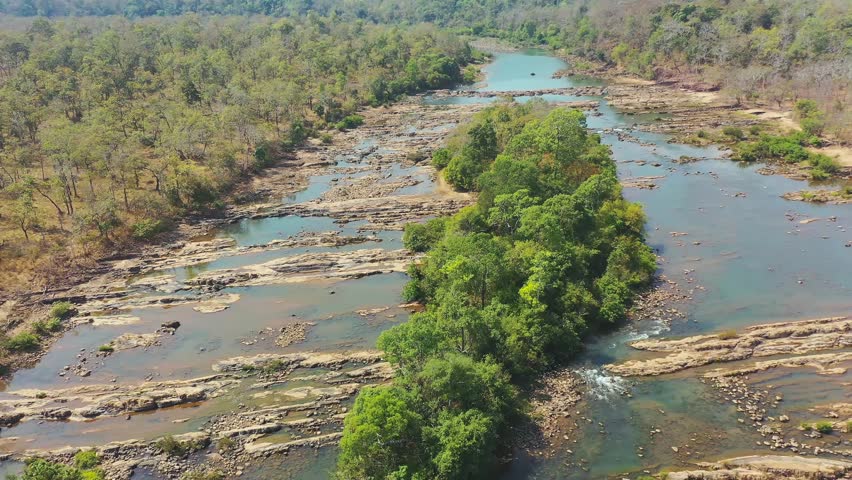 Aerial view of Tad Faed waterfall in Bolaven, Laos. Cinematic drone shot of river and forest in popular tourist destination of Boloven Loop. Royalty-Free Stock Footage #1107639985
