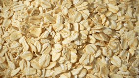 Rolled oats, a versatile whole grain, exhibit a flattened shape due to gentle processing. Their distinct texture and rich fiber content make them ideal for nutritious breakfasts or baking projects.
